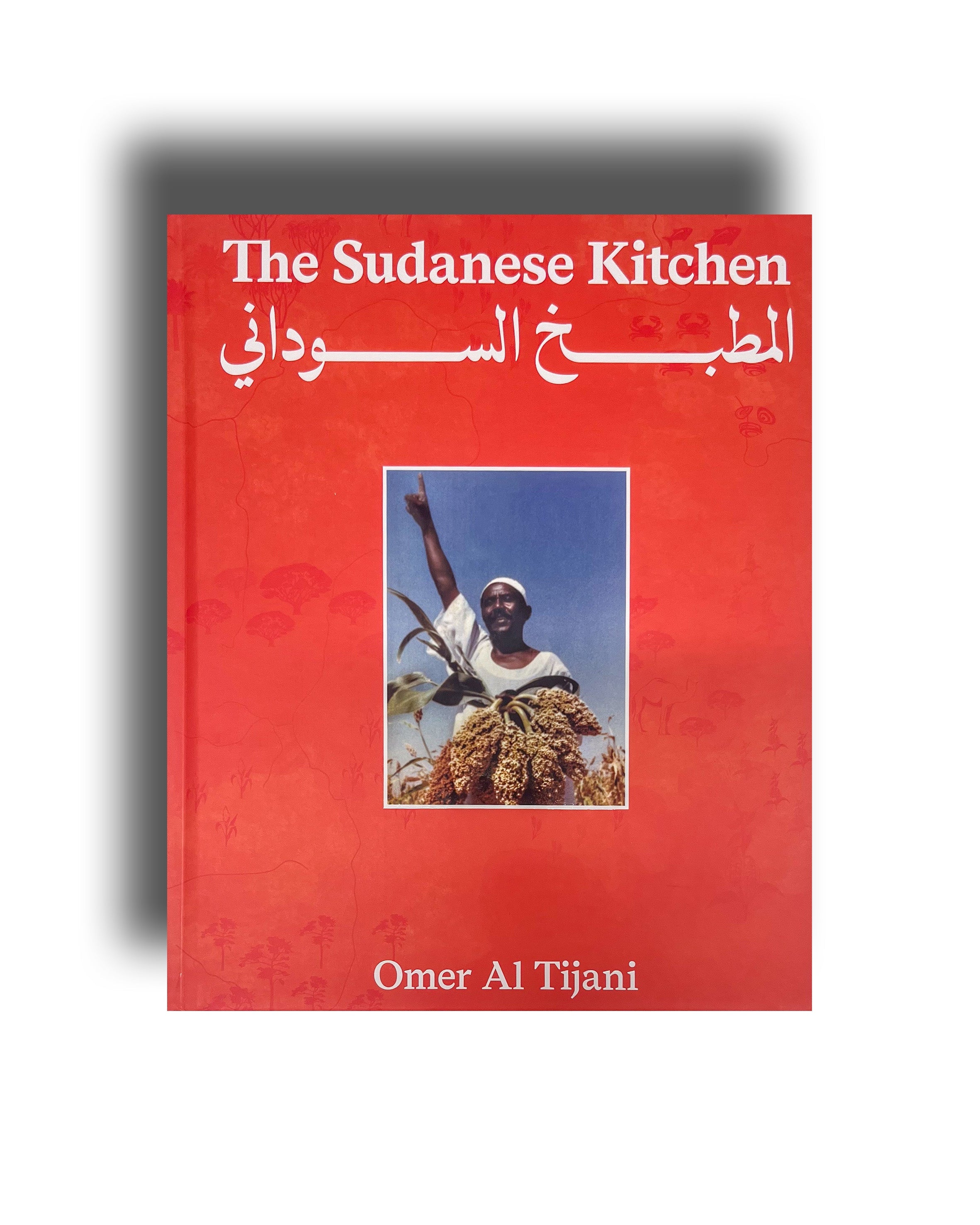 Book titled 'The Sudanese Kitchen' by Omer Al Tijani with a red cover and image of a person on a white background